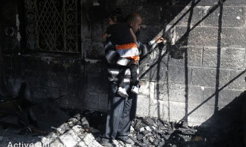 BREAKING: A Palestinian house ignited in the West Bank village of Sinjil, on the early hours of November 14, 2013, causing the family of seven to run away through the fires. The attack is suspected to be committed by Israeli settlers, which left a graffiti related to the killing of an Israeli soldier yesterday in Afula. (Oren Ziv/Activestills.org)